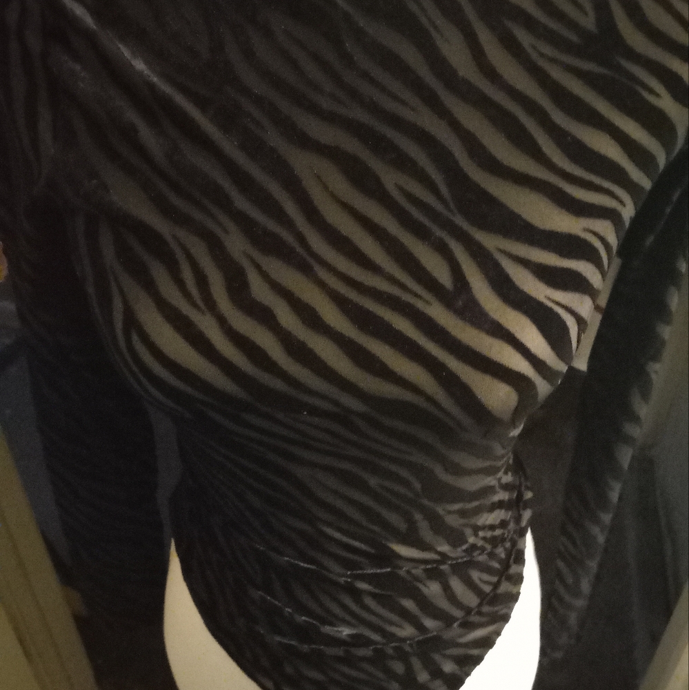 New,with tag burnout black zebra print bodysuit stretch top thong back size m.